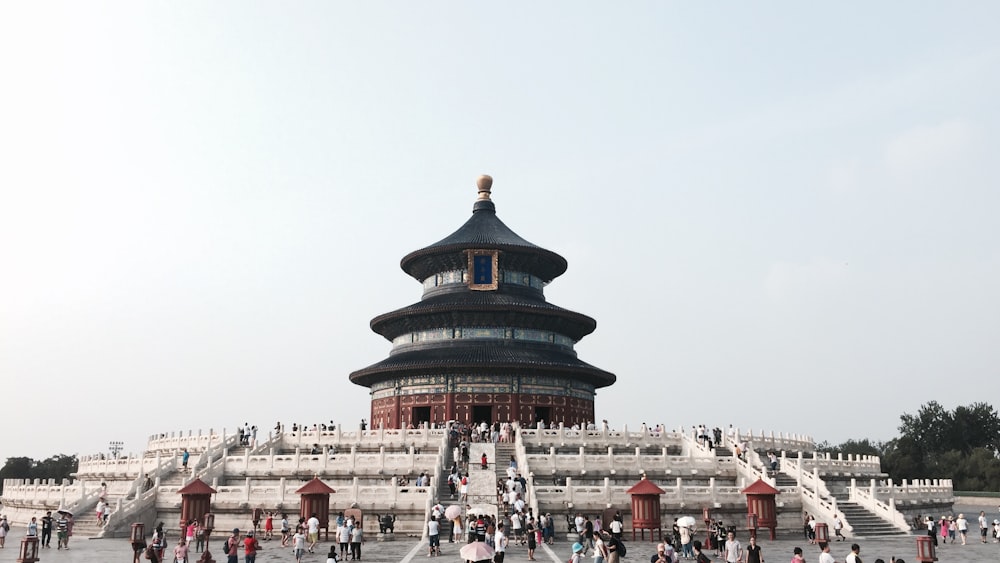 brown and white temple under clear blue sky