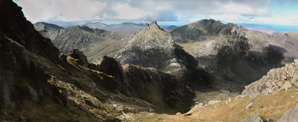 aerial photography of mountain under gray clouds