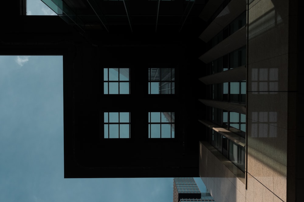 worm view of building under blue sky