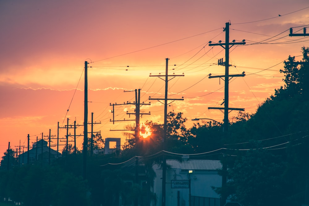 brown electrical towers at daytime