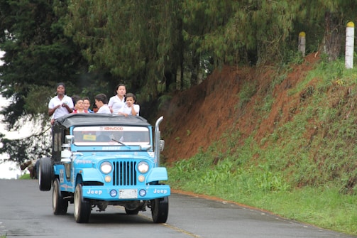A group of tourists enjoying a jeep tour.