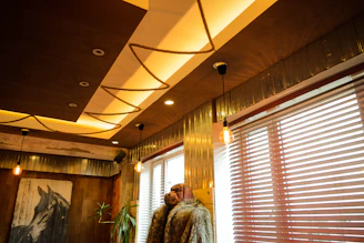 Elegant dark-themed workspace with golden accents and horse-inspired design elements.