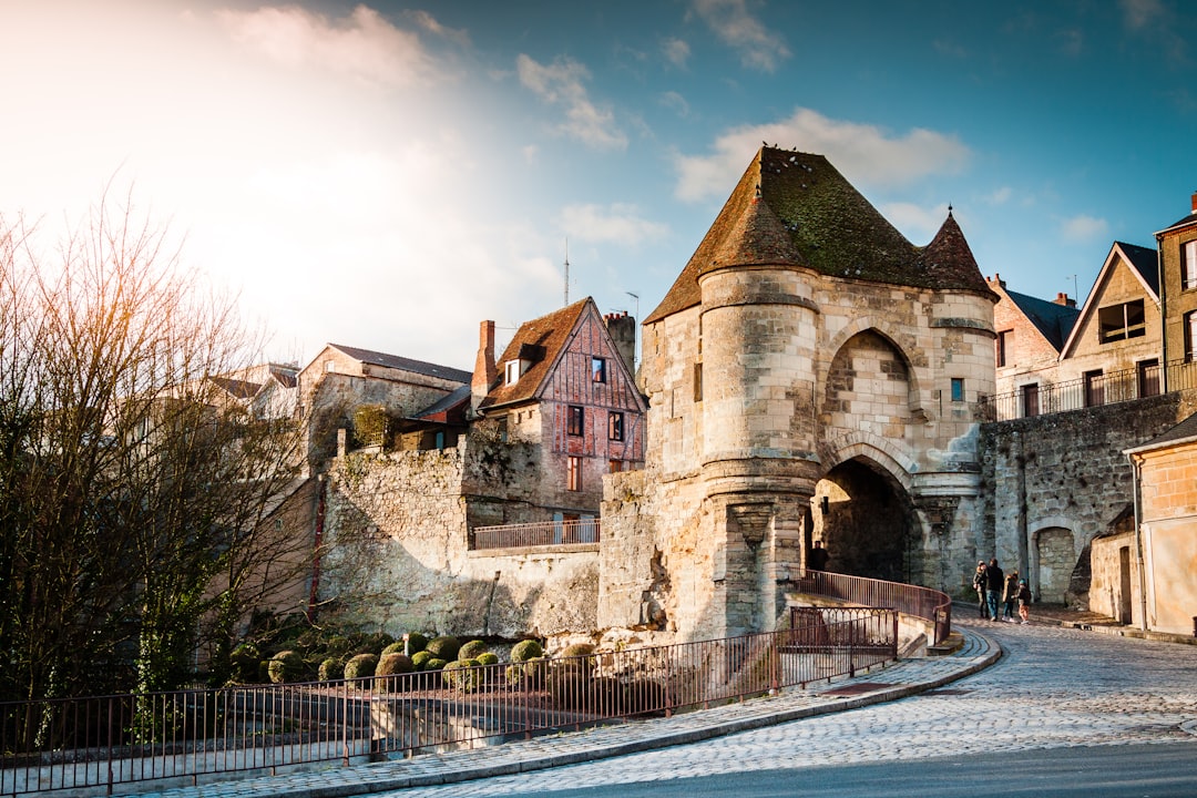 white and brown concrete structure during day, “La Porte d’Ardon”, the Ardon’s gate, or Royal gate in Laon, north of France. Part of the fortification of the old town.<p></figure>The remains of the medieval times gives a real “cachet” to the town.
