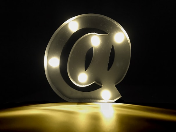 A glowing futuristic device surrounded by soft light, symbolizing innovation and anticipation.