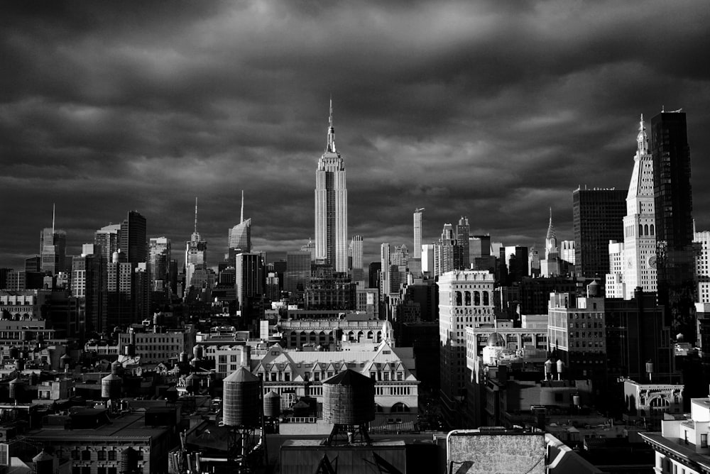 grayscale photo of high rise buildings