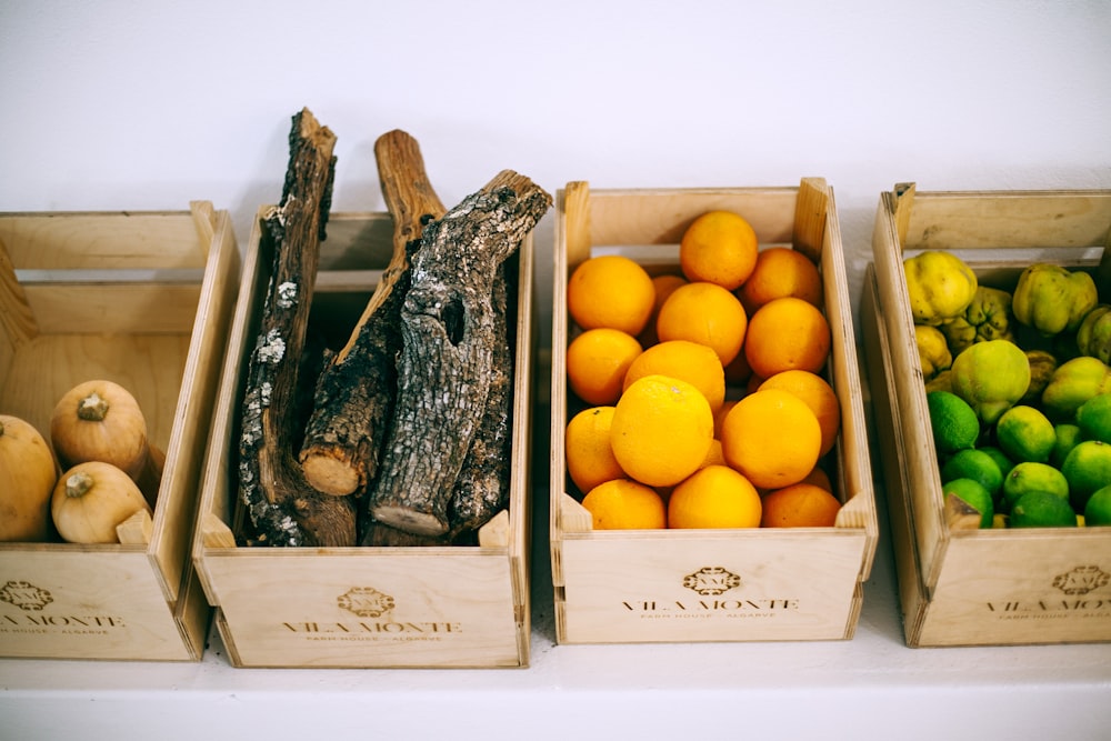 assorted fruits on brown wooden crates