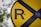 closeup photo of yellow and blue R road signage