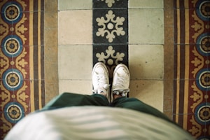 Versatile couple styles of fleece shoes side by side on ceramic tiles