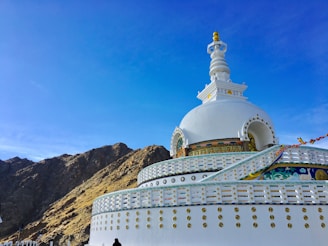 white mosque under clear sky during daytime