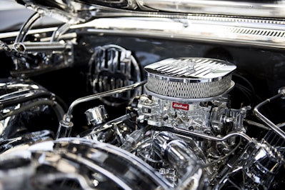 Close-up of a shiny Mustang engine block with chrome details