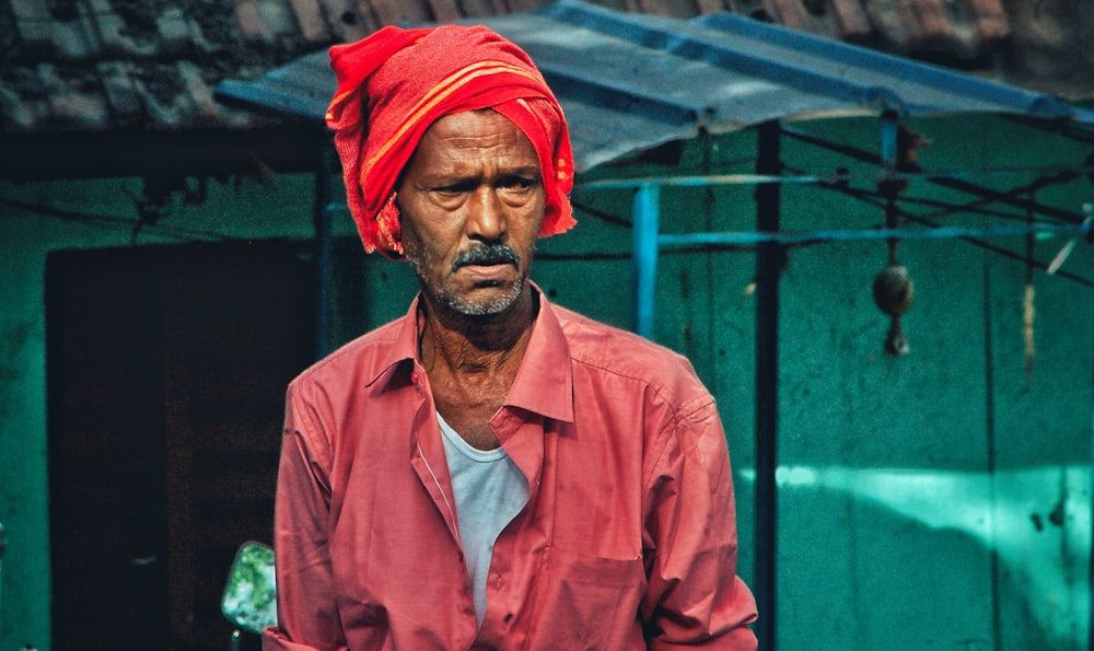 landscape photography of man near green house