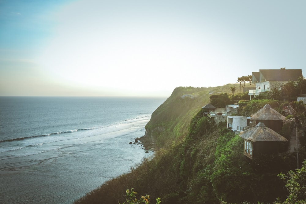 aerial photography of house on mountain cliff during daytime