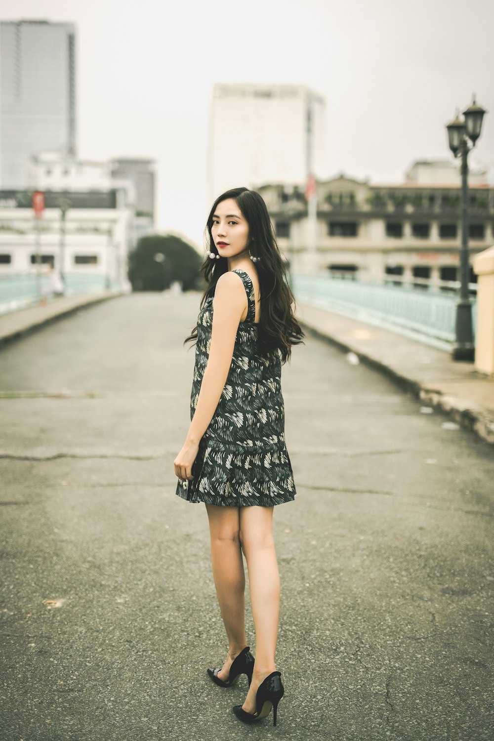 woman standing on road