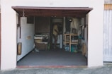 A friendly neighbor showing a spacious garage for storage.