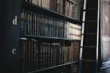 black wooden d and c bookshelf