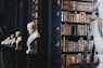 book lot on black wooden shelf