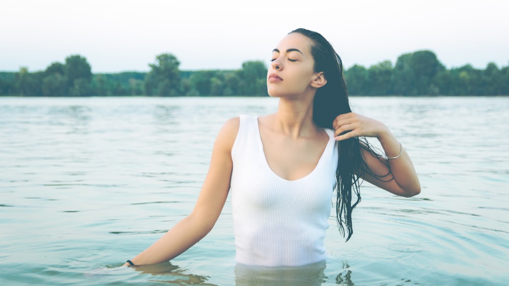 woman soaking in body of water