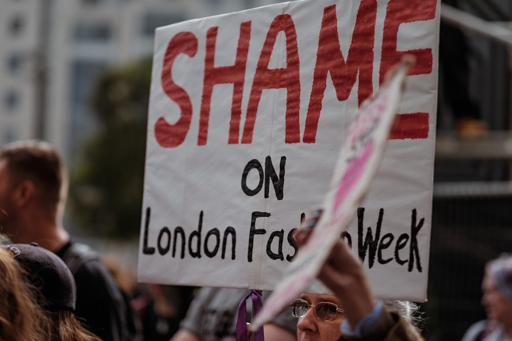 group of person waving banner