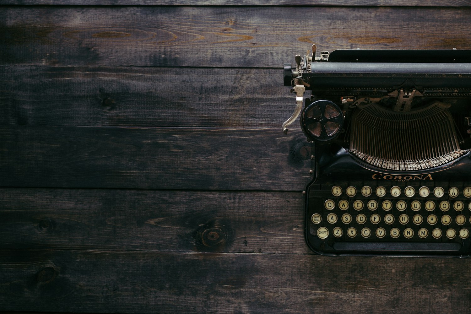 Black typing machine on the table