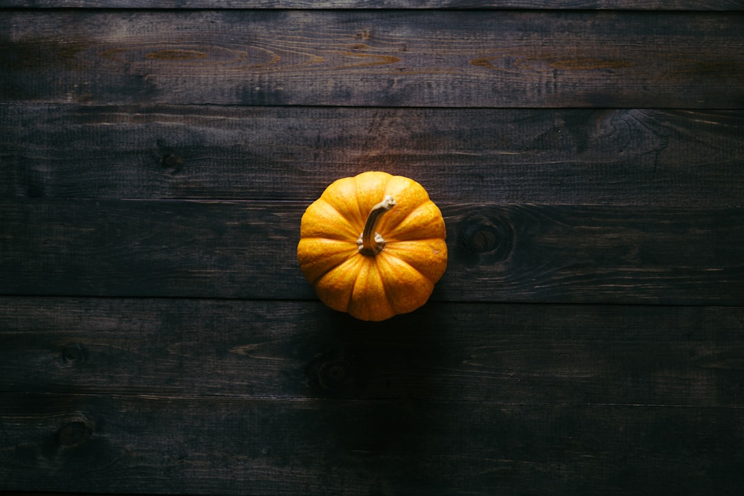 pumpkin on wooden board