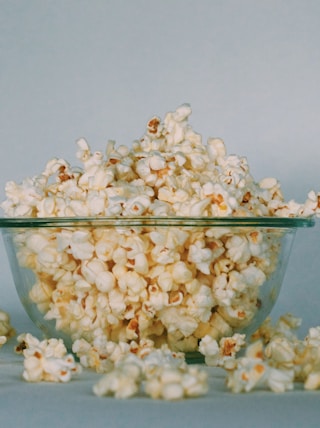 popcorns on clear glass bowl