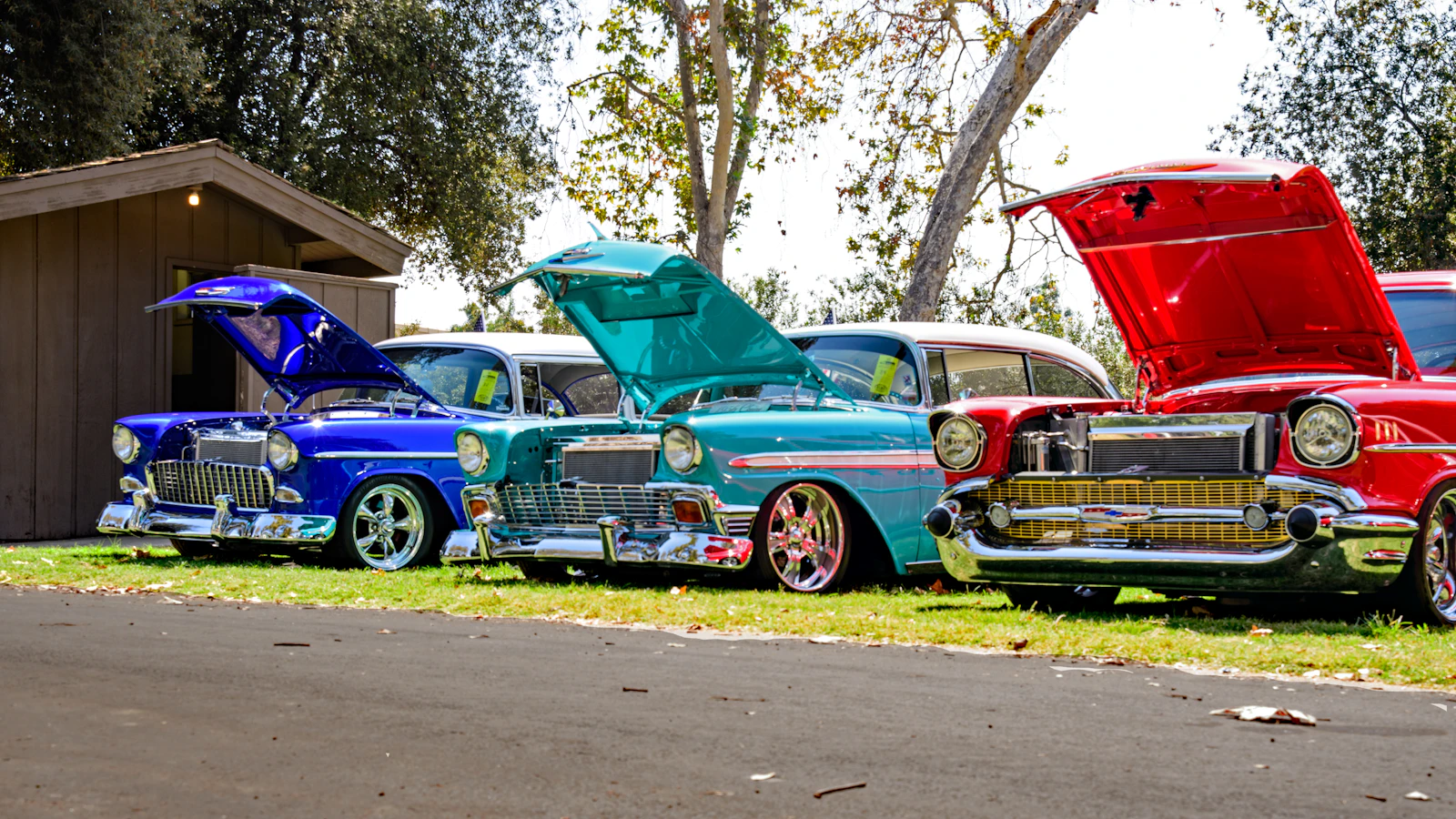 A group of classic cars at a show