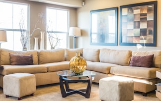 brown sofa in a room during daytime