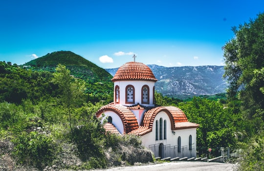 cathedral with mountain background in Kymi Greece