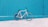 white road bike leaning on teal wooden wall during daytime