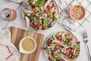 flat lay photography of two bowls of fruit and vegetable salad