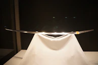 The sword reflecting sunlight with a fine gleam, symbolizing truth and clear thinking.