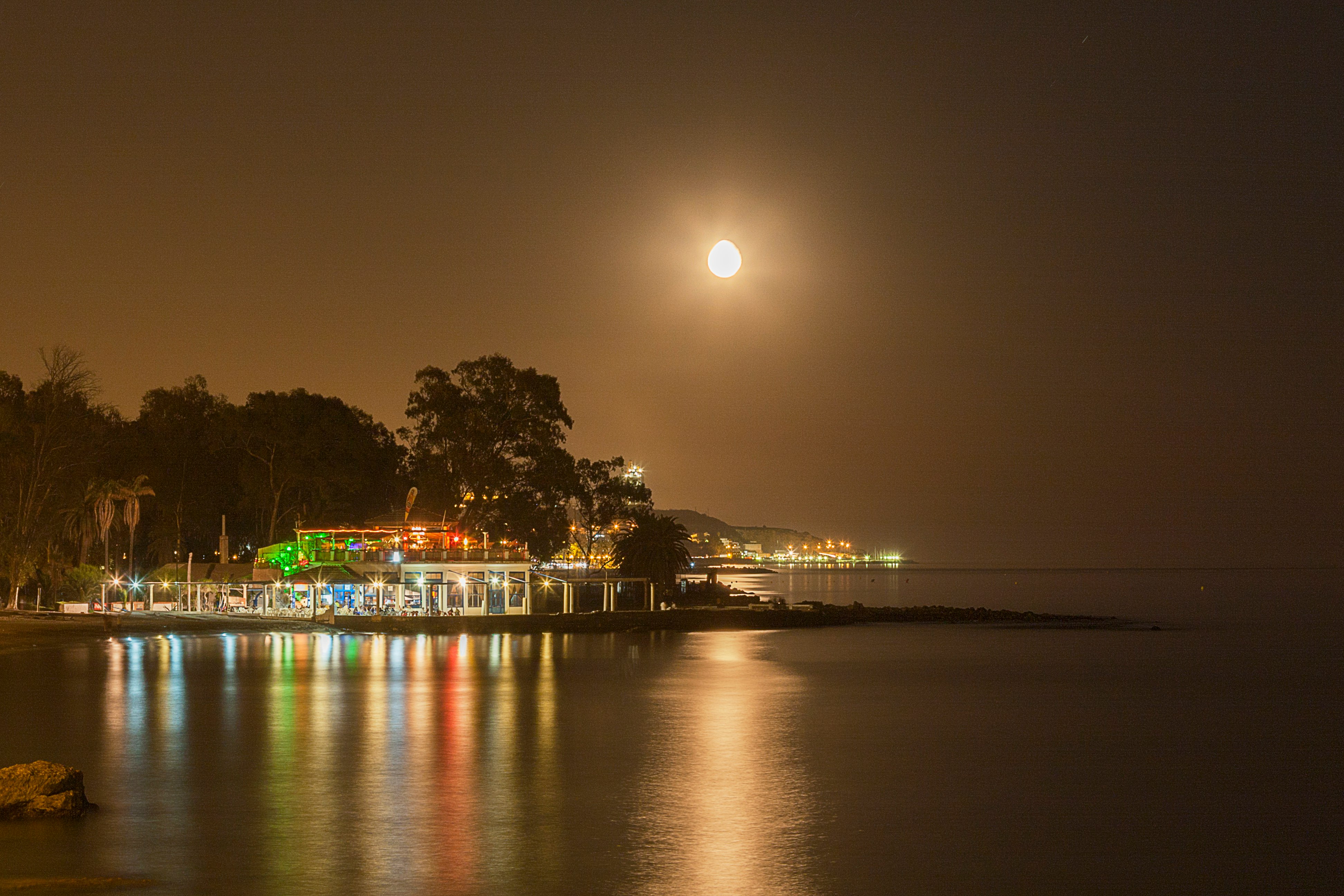 city lights near sea