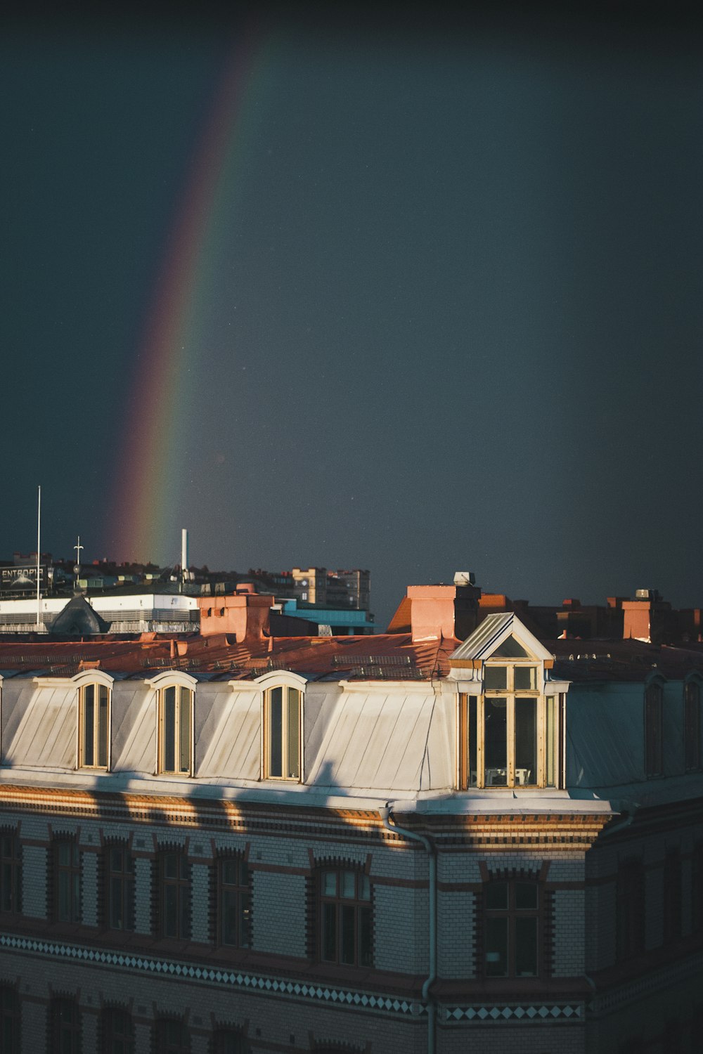 rainbow over buildings
