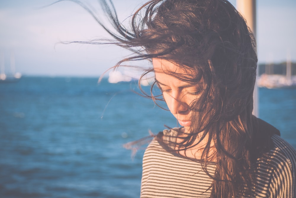 woman's hair blown by the wind