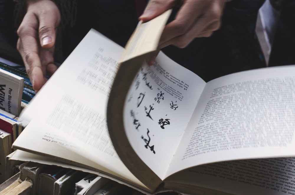 person holding book