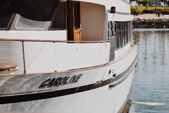white and black Caroline boat taken at daytime in Long Beach United States