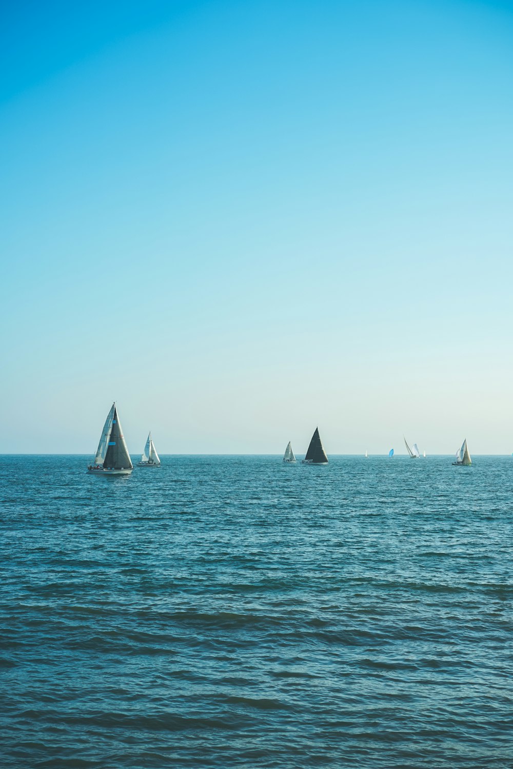 sailboats on body of water during daytime