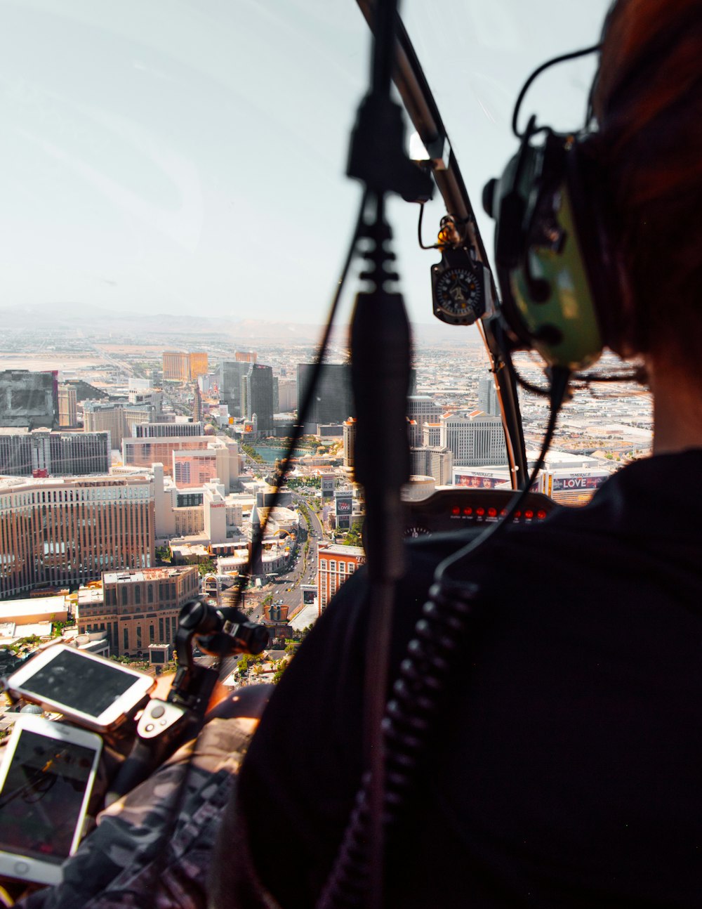 person wearing green headset