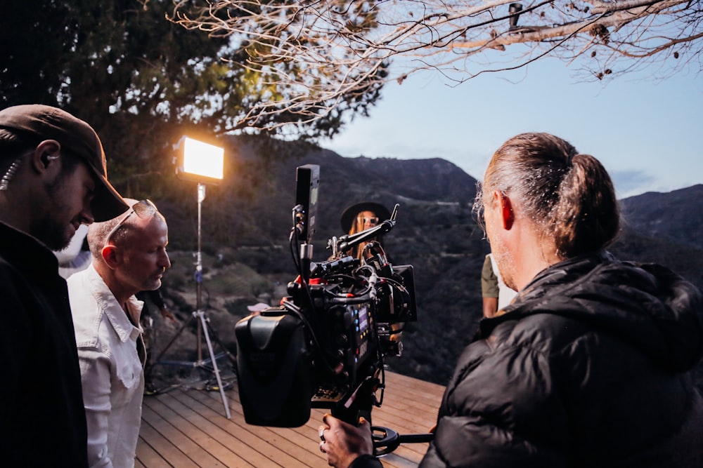 person holding video camera