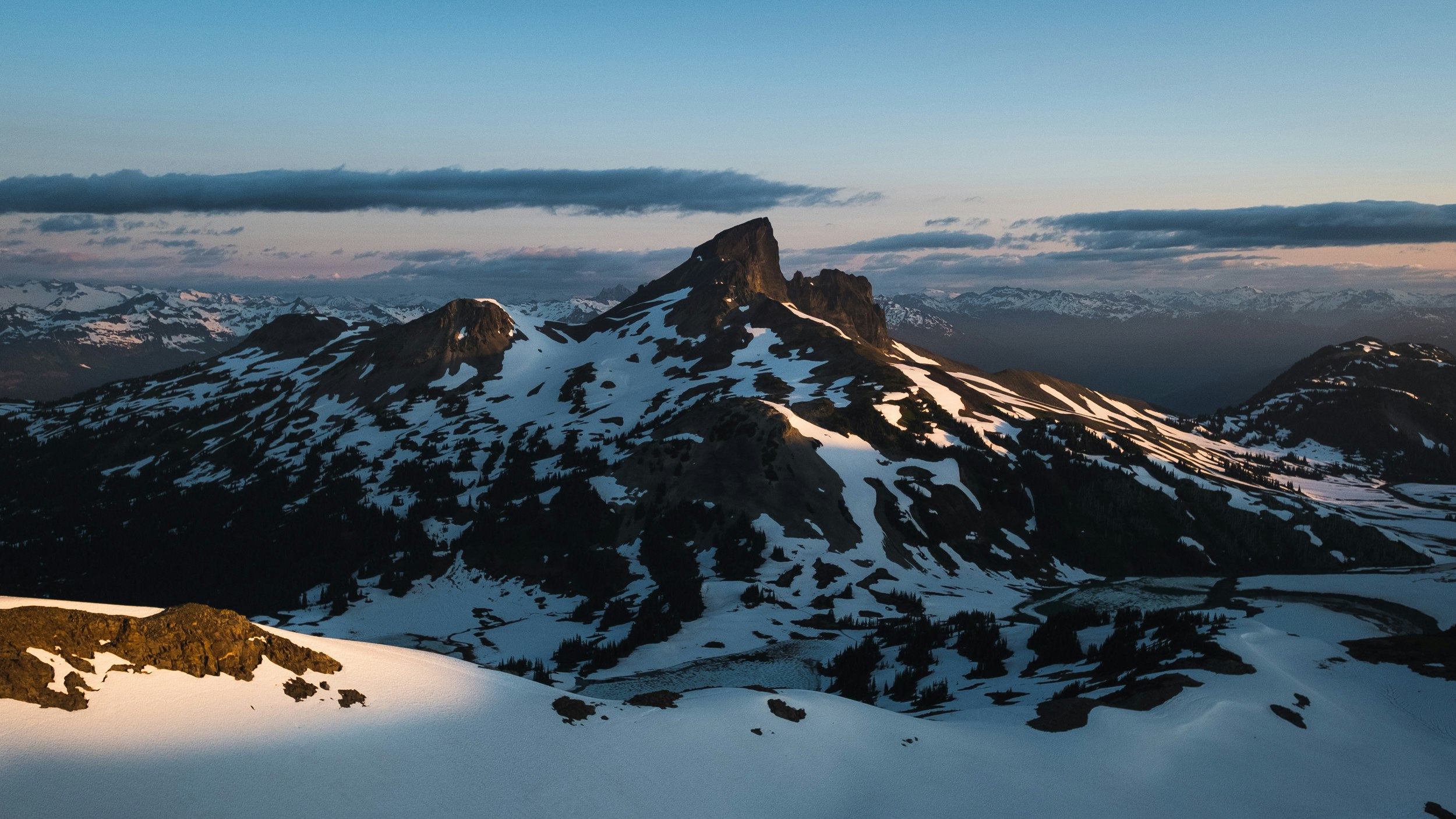 mountain range covered in snow