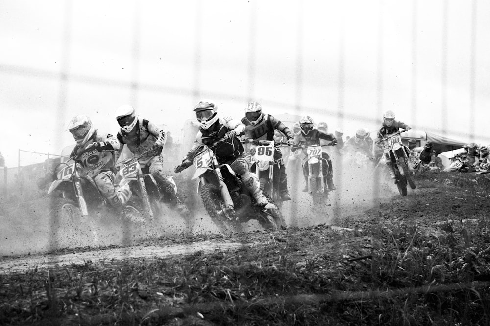 grayscale photo of dirt bike racing