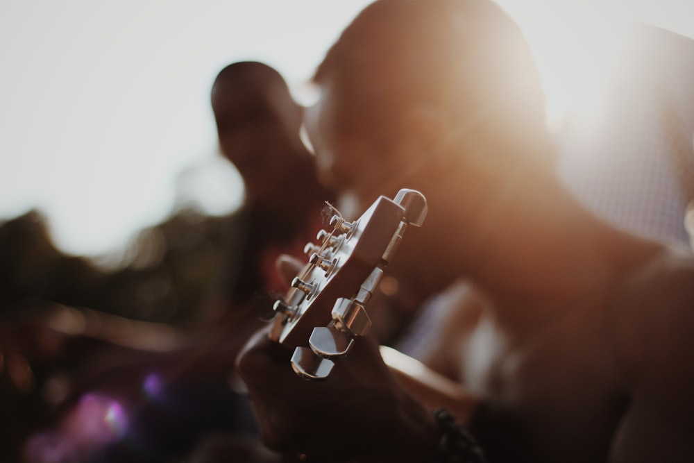 man playing guitar