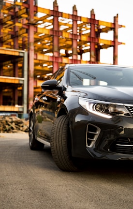 black car parked near building