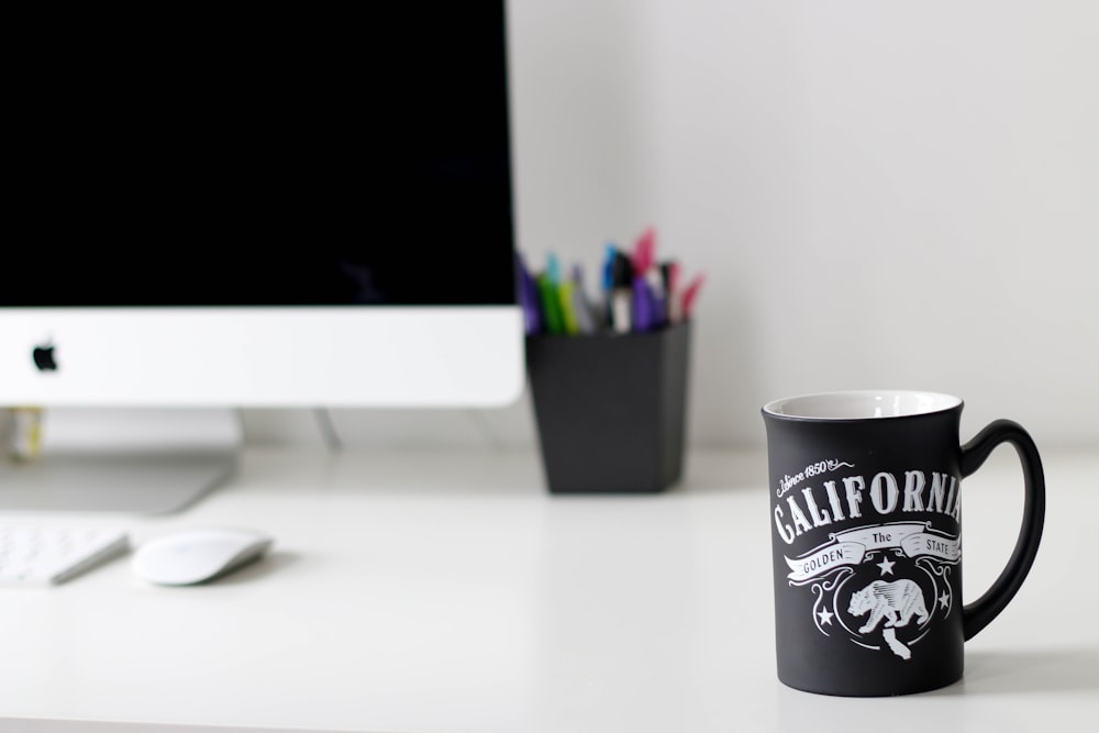 black California printed ceramic mug on table