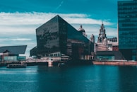 building near bodies of water at daytime