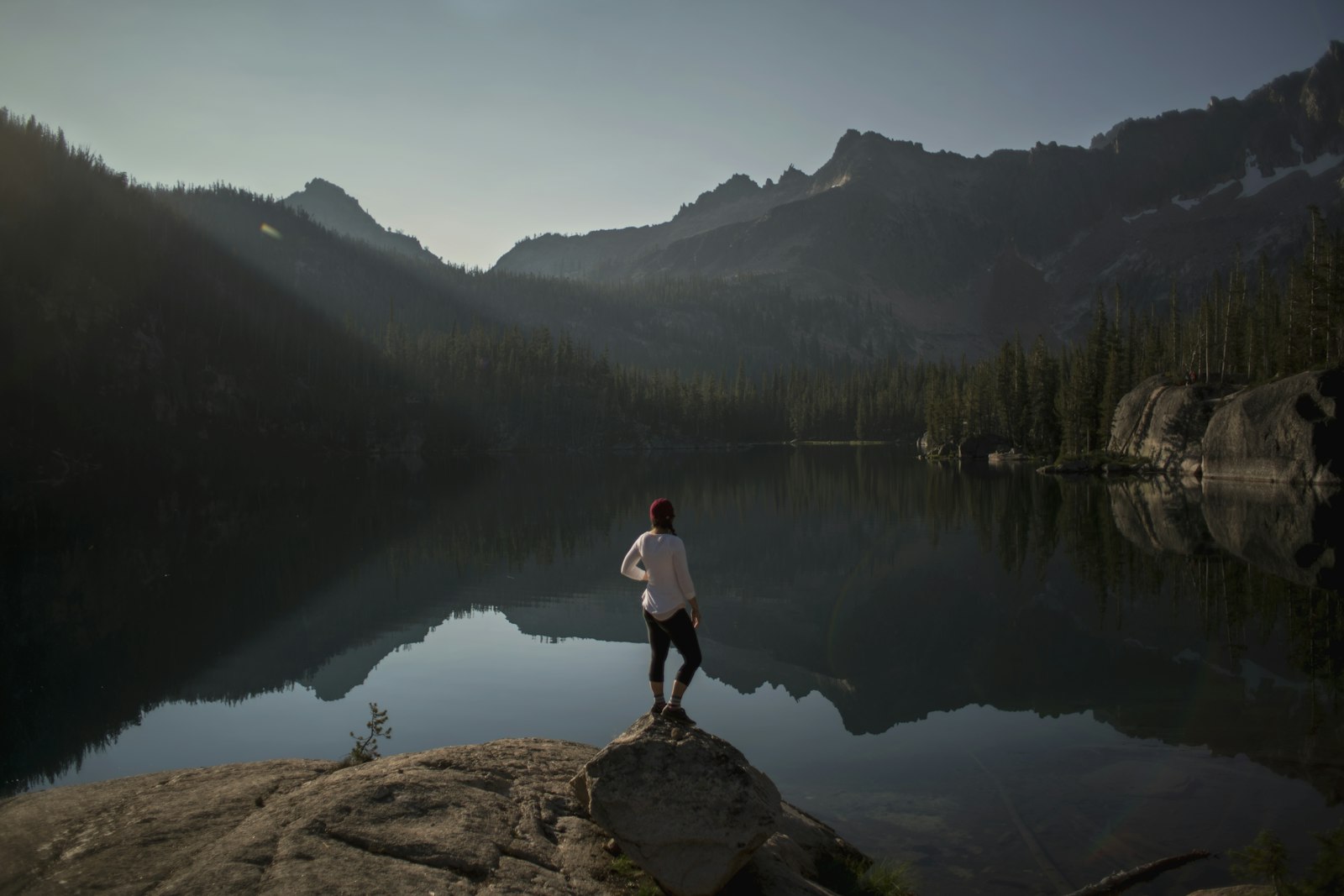 Canon EF 28mm F1.8 USM sample photo. Person standing on cliff photography