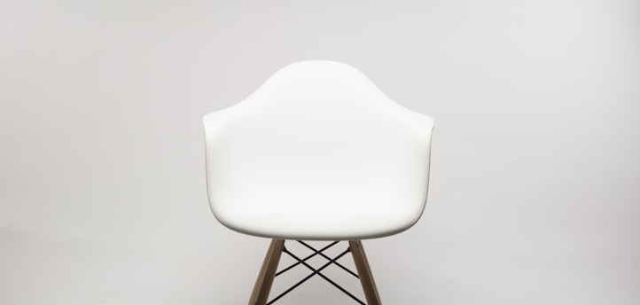 white wooden armchair