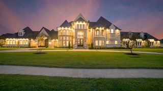 white and black lighted concrete house