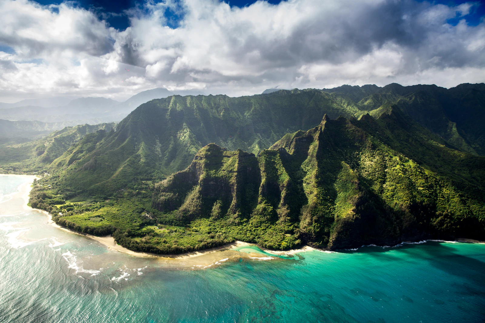 Deep green coastal cliffs representing Kauaʻi and the Nāpali Coast