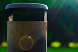 Close-up of a metallic urban waste bin with a smooth modern finish
